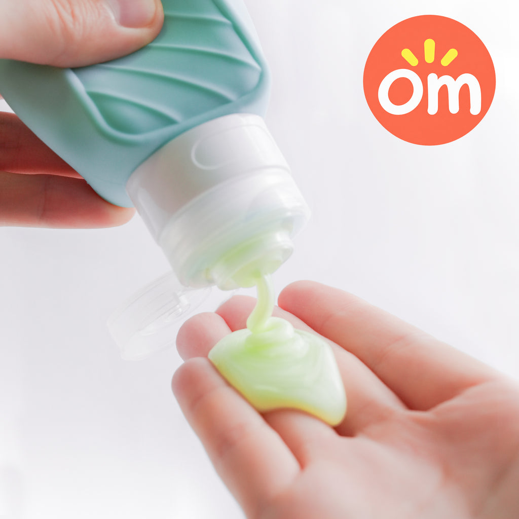 Easy-to-squeeze silicone travel bottle dispensing shampoo and lotion smoothly
